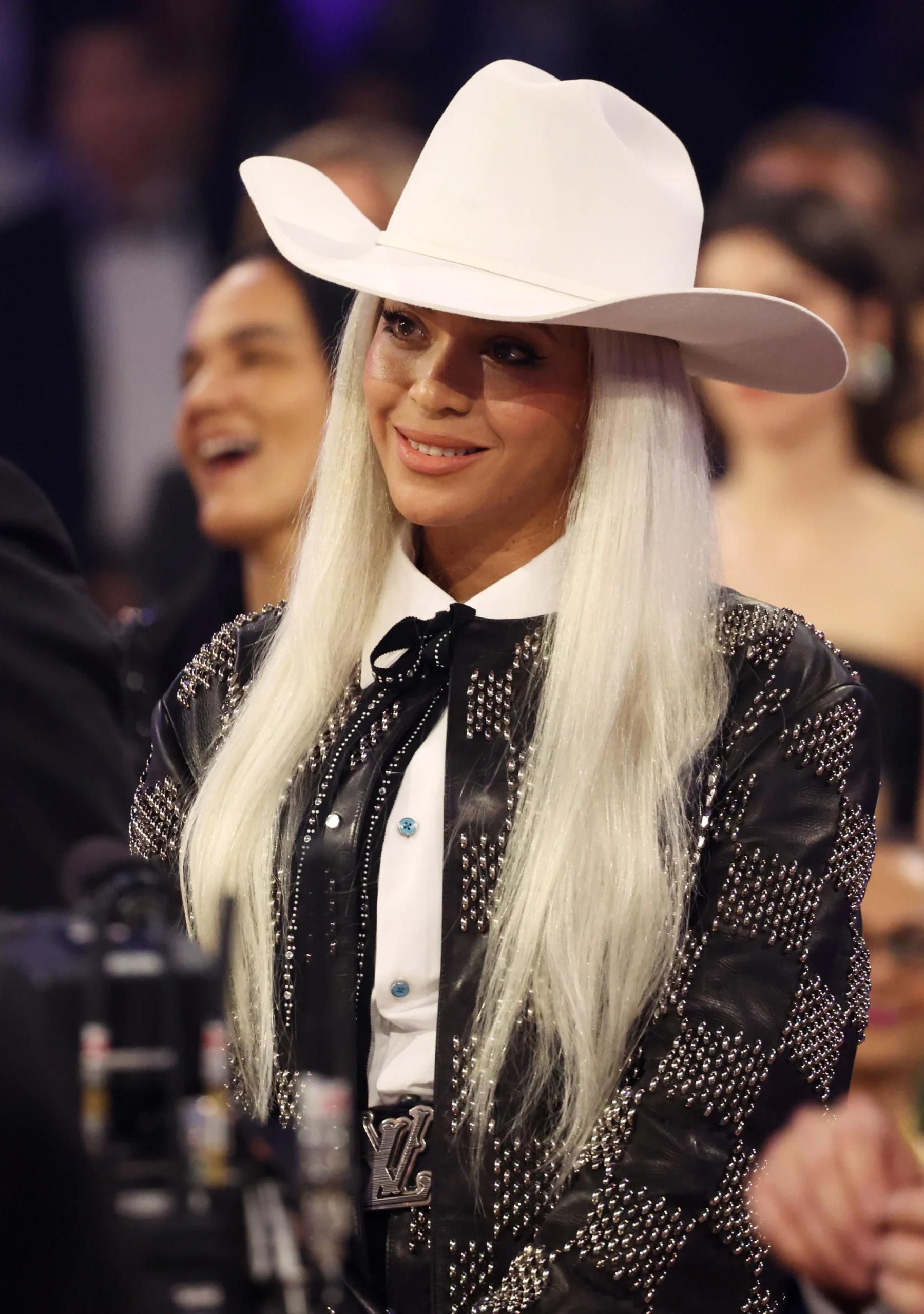 Beyoncé Snuck Into the 2024 Grammys in an Unsubtle White Hat and Bedazzled Leather Shorts Suit
