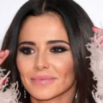 Cheryl looks flawless in slinky lace gown with transformed hair