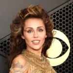 Miley Cyrus Wore a Completely transparent, Gold Netted Dress to the 2024 Grammys