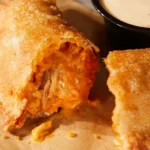 Taco Bell adds the Cheesy Chicken Crispanada to menu - and chicken nuggets are coming